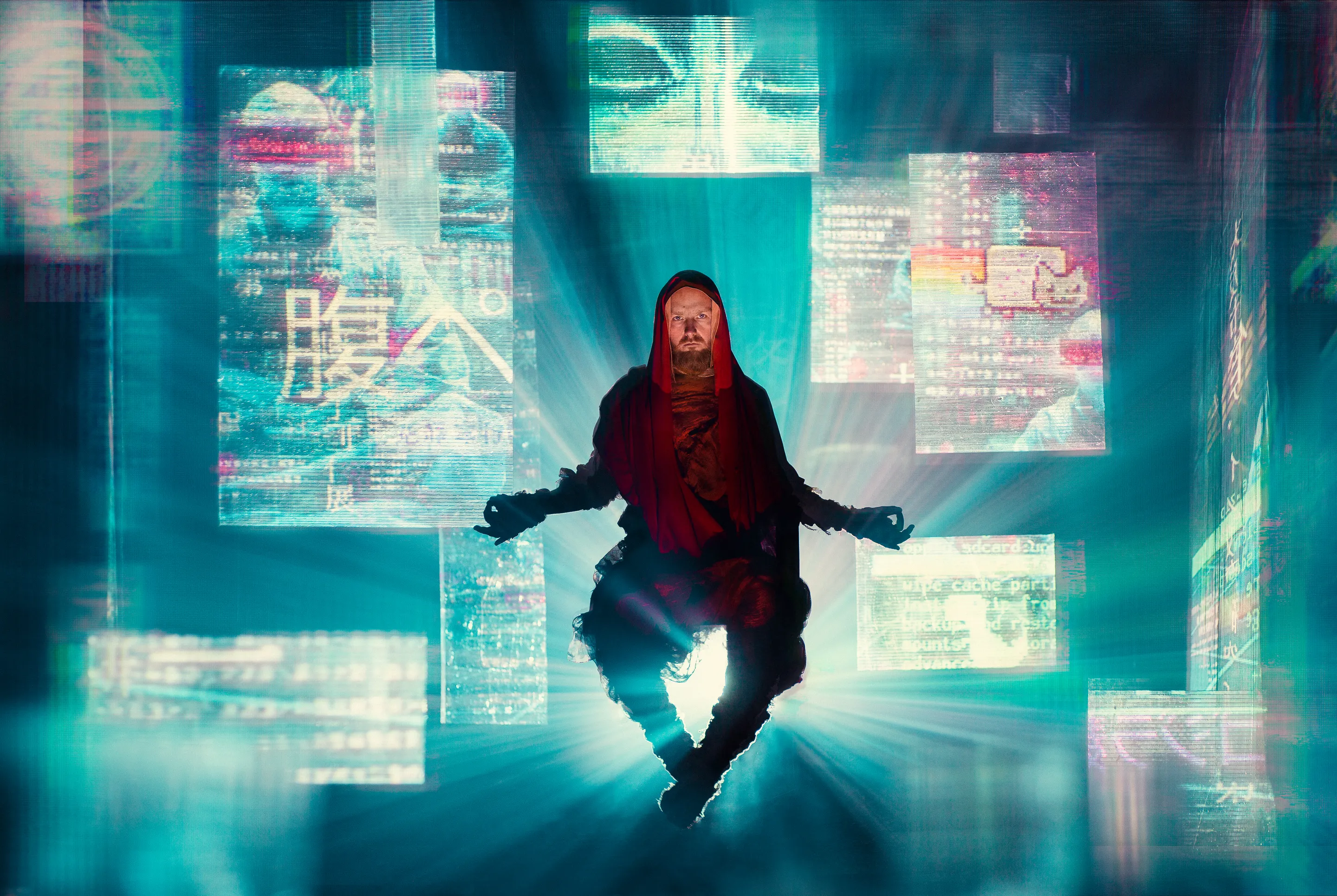 Buritō Kōsu course key visual by Andrei Kovalev: a hooded figure meditates in lotus pose amid a glowing, screen-lit city.